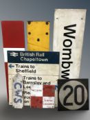 A group of assorted railway signs and barriers including enameled metal examples,