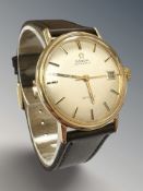 A gent's 18ct gold Omega De Ville automatic centre seconds calendar wristwatch,