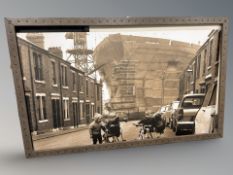 Two large photographic prints depicting scenes of Newcastle,