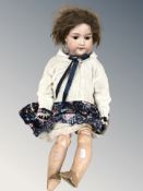An Armand Marseille bisque headed jointed doll, stamped made in Germany 390, IIRNG 246/1 AHM,