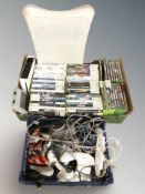 A Nintendo Wii console, various controllers and leads, various Nintendo Wii and Xbox video games.