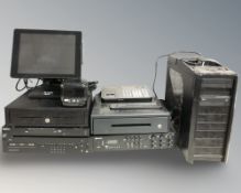 A CCTV video recorder, a monitor, PC tower, two cash drawers, etc.