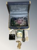 A jewellery box containing costume pieces, malachite bead necklace, gents Timex quartz wristwatch,