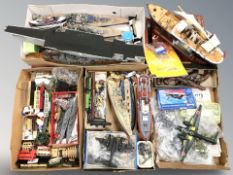 A group of scale model ships, toys, aircraft, replica flintlock pistols, etc.