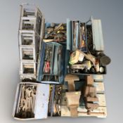 Several Concertina toolboxes containing tools, hardware, two large bench vices, car ramps, etc.