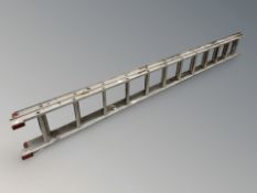 An aluminium extension ladder