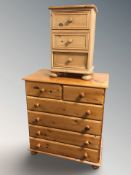 A modern pine six drawer chest, 79 cm x 45 cm x 89 cm, plus a further three drawer bedside chest.