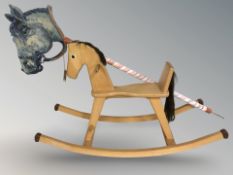 A small child's rocking horse and a hobby horse.