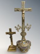 An ornate Victorian gilt brass enamelled and cabochon stone set crucifix,