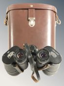 A pair of Carl Zeiss Jena Jenoptem 10x50W binoculars in leather case.