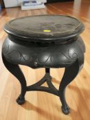 An oriental style carved and ebonised plant pedestal, height 51 cm.