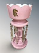 A Victorian pink glass table lustre, height 35 cm.