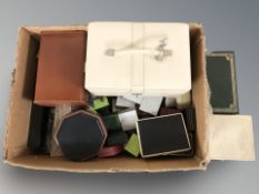 A box of empty jewellery boxes and ring boxes.