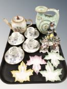 Four French Haviland porcelain coffee cans and saucers, three continental porcelain figures,