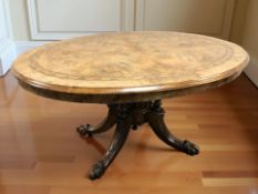 A Victorian figured walnut and satinwood parquetry inlaid oval breakfast table,