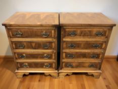 A pair of reproduction yew wood four drawer bedside chests, each 45 cm x 33 cm x 63 cm.