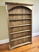 A modern pine open bookcase, 115 cm x 26 cm x 186 cm.