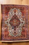 A Hamadan rug, North-West Iran, 204 cm x 134 cm.