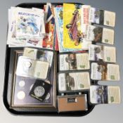 Several Brooke Bond picture card albums, stamps, American quarter dollar collector's coins,