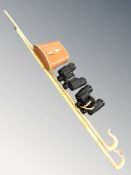 Two shepherd's crooks, a pair of Halina 20x50 binoculars and a pair of Omega 7x50 binoculars.