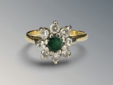 An 18ct gold emerald and diamond cluster ring, size K CONDITION REPORT: 3.