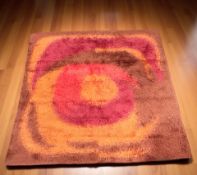 A 1970's woolen rug, 200 cm x 196 cm.