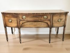 A Regency style mahogany bow front sideboard, 183 cm x 65 cm x 90 cm.