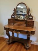A Victorian mahogany bow front mirror back dressing table, 122 cm x 56 cm x 160 cm.