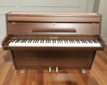 A Zender mahogany cased overstrung upright piano, retailed by Alderson & Brentnall Limited,