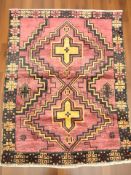 A Baluch rug, 138 cm x 105 cm.