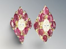 A fine quality pair of 18ct yellow gold ruby and diamond earrings.