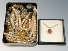 A silver gilt Murano glass pendant on similar chain, a Florenza moon brooch,