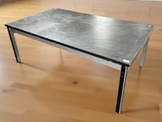 A Scandinavian slate topped coffee table.