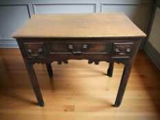 A George III oak side table, fitted three drawers, 75 cm x 46 cm x 70 cm.