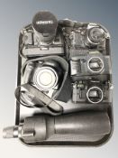 A Canon A-1 camera body with Tamron 28-80mm lens, a further AE-1 camera body, T70 camera body,