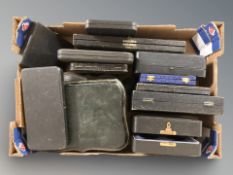 A box of empty cutlery cases, antique and later examples.