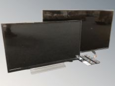 A Panasonic 40 inch LCD TV and a Toshiba TV with leads and remotes