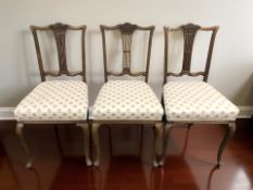 Three late Victorian carved mahogany occasional chairs.