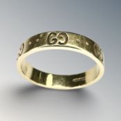 An 18ct yellow gold Gucci 'Icon' ring, size N½. CONDITION REPORT: 4.