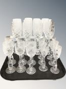 A set of eleven etched crystal champagne flutes, two further sets of six smaller glasses.