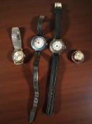 Two lady's silver wristwatches, one with enameled case,