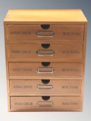 A reproduction miniature haberdashery chest, height 31 cm.