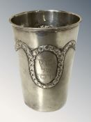 An Eastern silver beaker, stamped 800, height 8.5 cm. CONDITION REPORT: 71.6g.