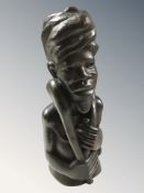 A Democratic Republic of The Congo carved ironwood bust of a man,