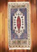 A Caucasian rug,