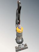 A Dyson DC40 upright vacuum cleaner.