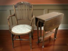 An inlaid mahogany armchair and a drop leaf occasional table.