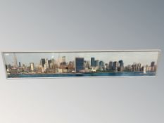 A colour print depicting the New York skyline, 34 cm x 200 cm.