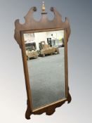 A contemporary Chippendale style mirror, 112 cm x 55 cm.