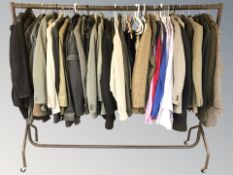 A rail of gent's blazers, jumpers, dress shirts, jackets, etc.
